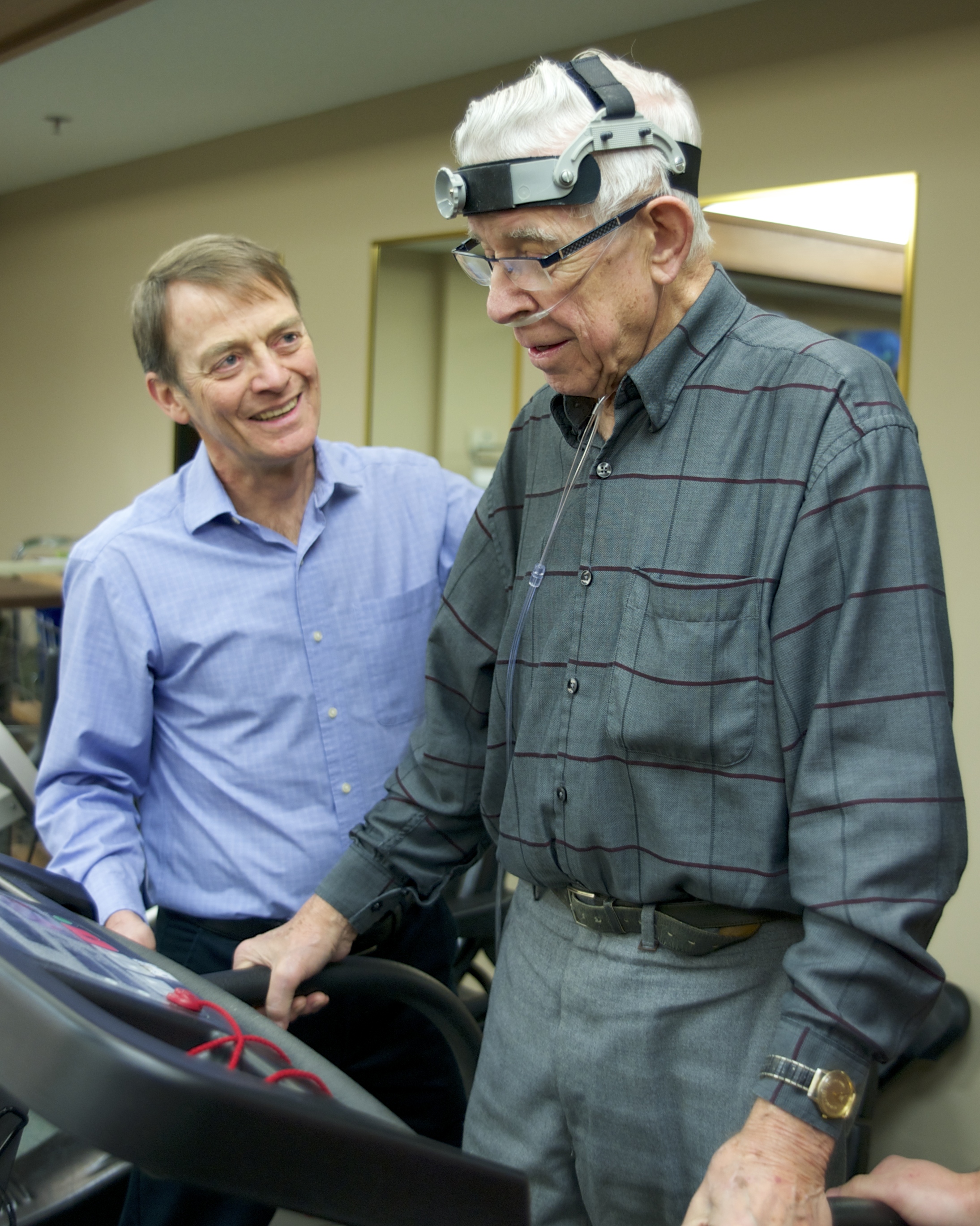 Richard Hughson, researcher, monitoring senior on a treadmill