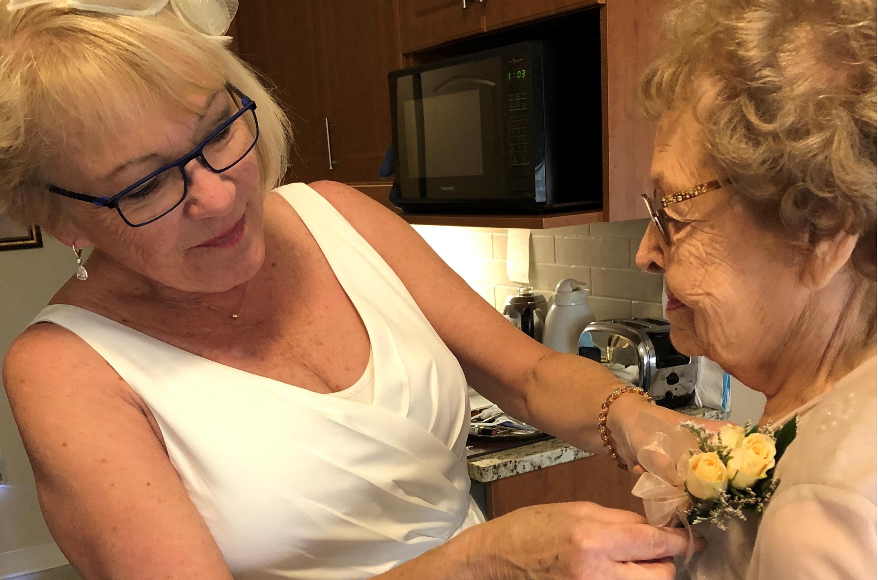 Darla and her mother Pat prepare for the wedding ceremony.