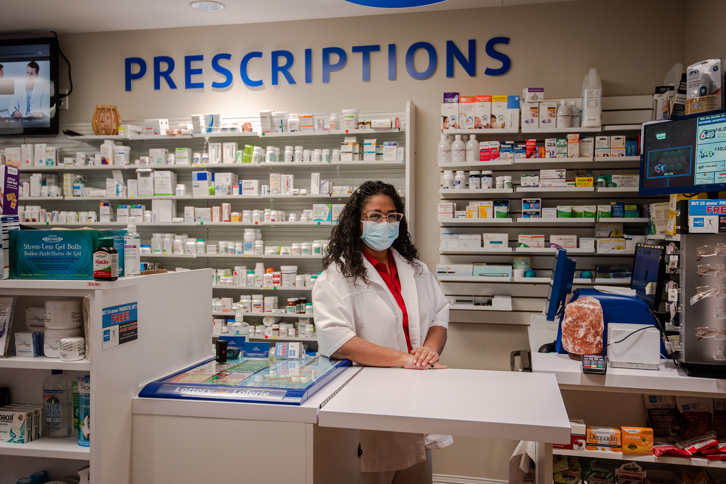 Lady at the counter in the Village IDA pharmacy