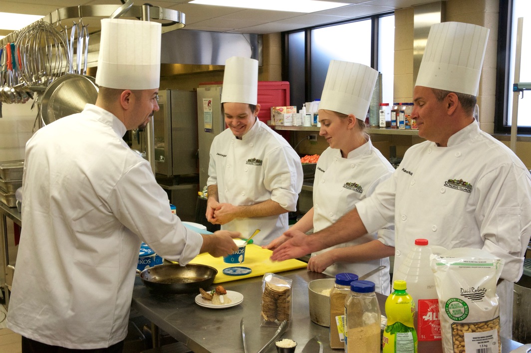 Food services team working in the Village kitchen