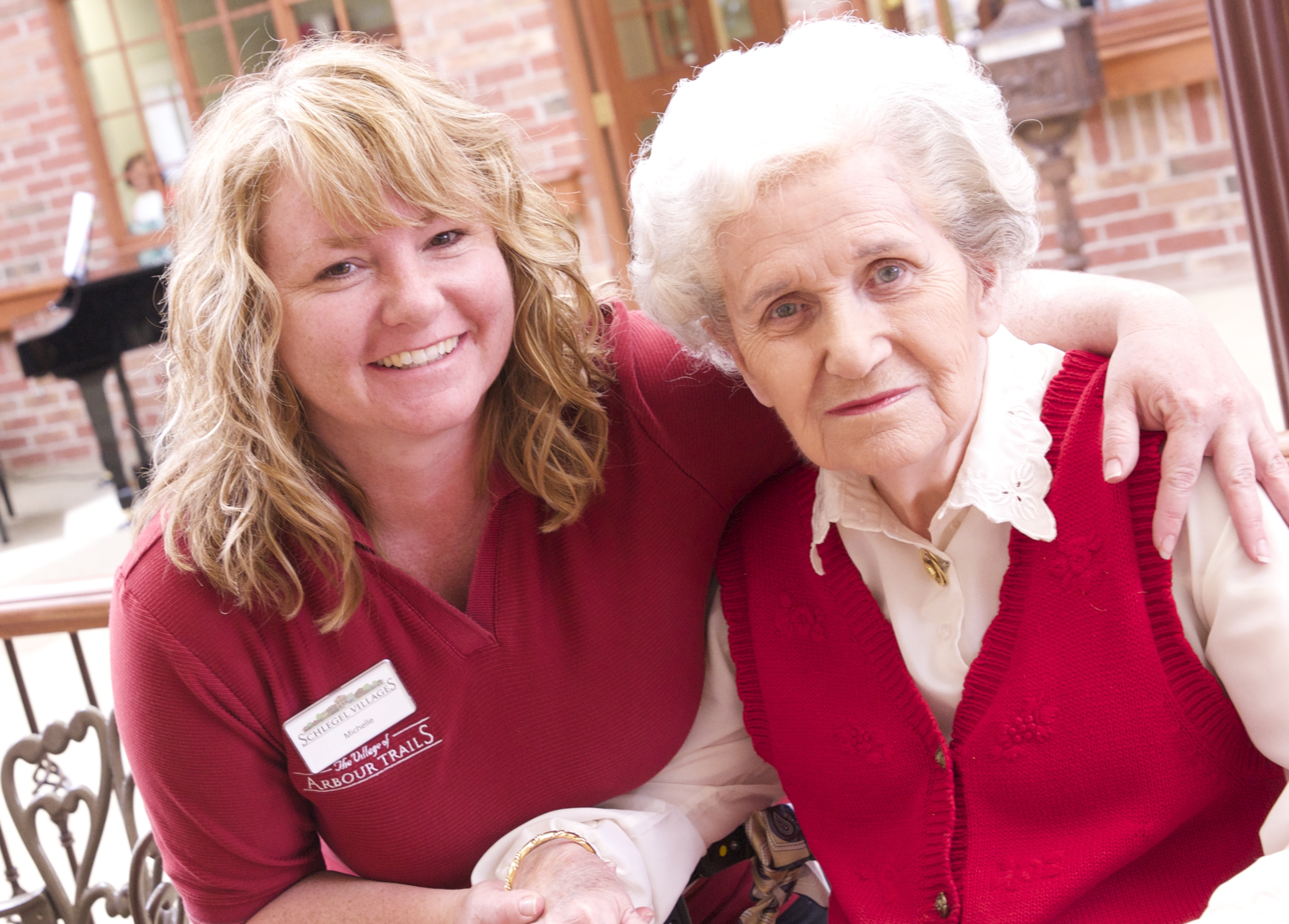 Team member hugging resident