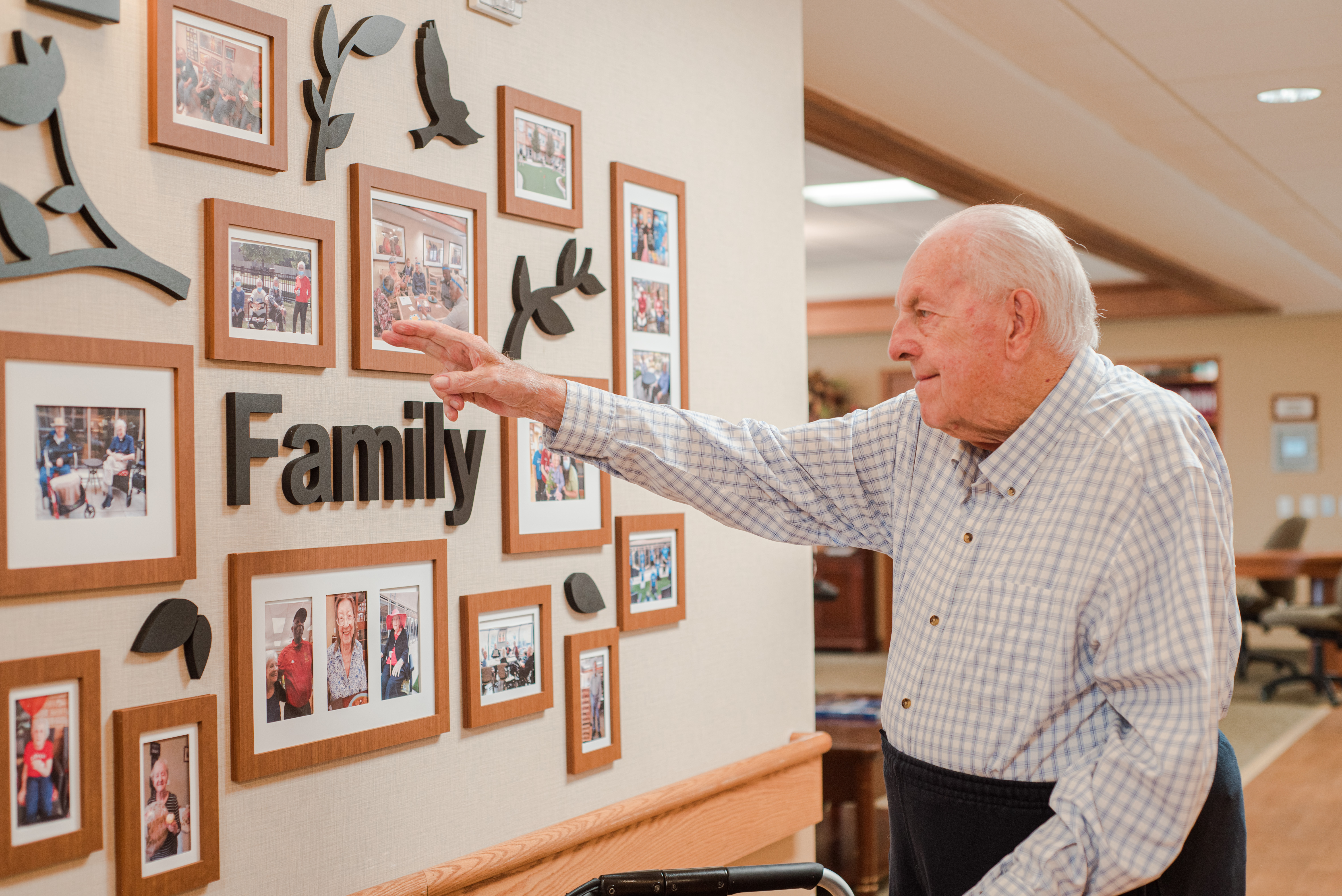 Resident looking at the Family photo gallery