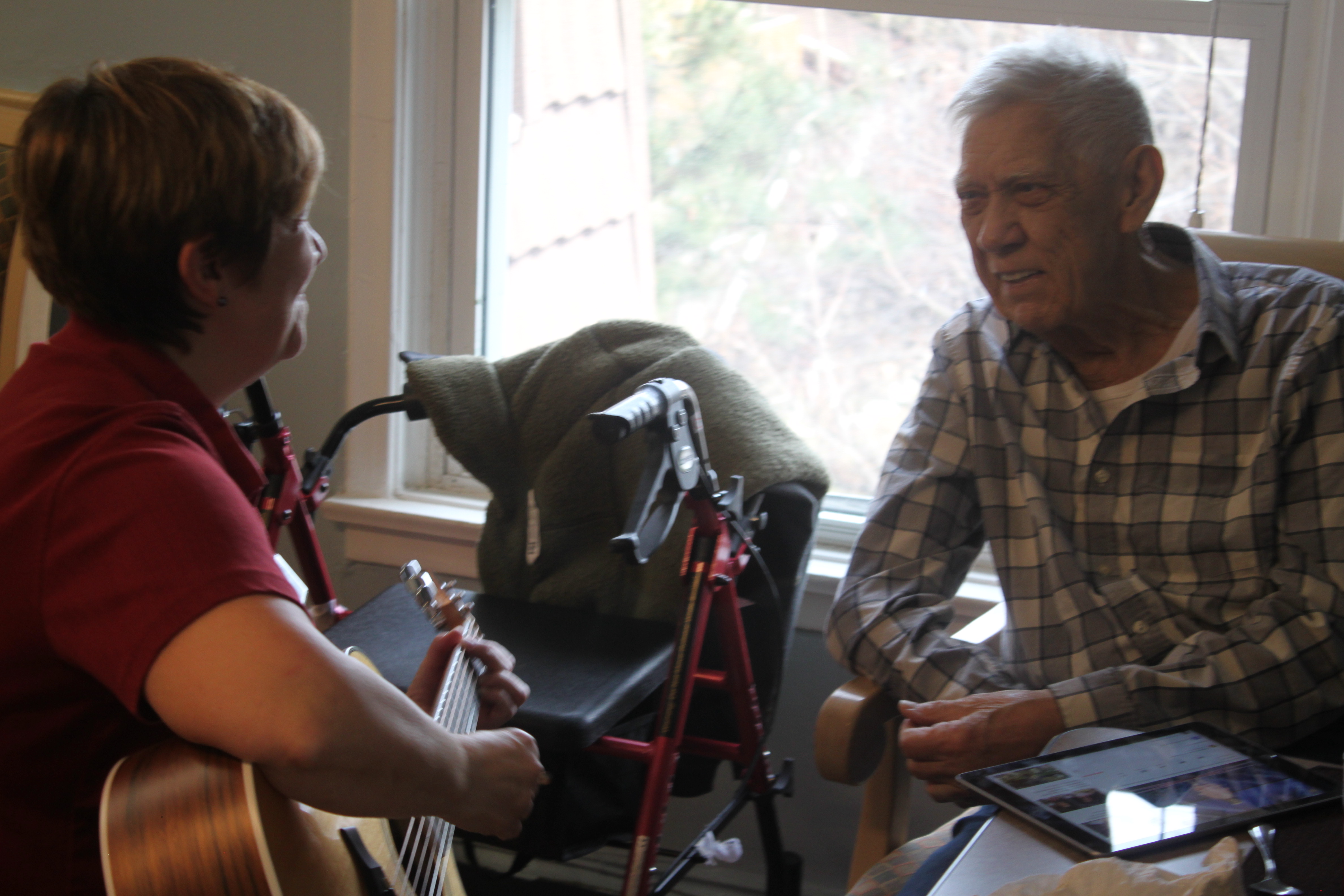 Tracy and Ray connected easily at Hamilton Continuing Care as soon as a guitar came out.