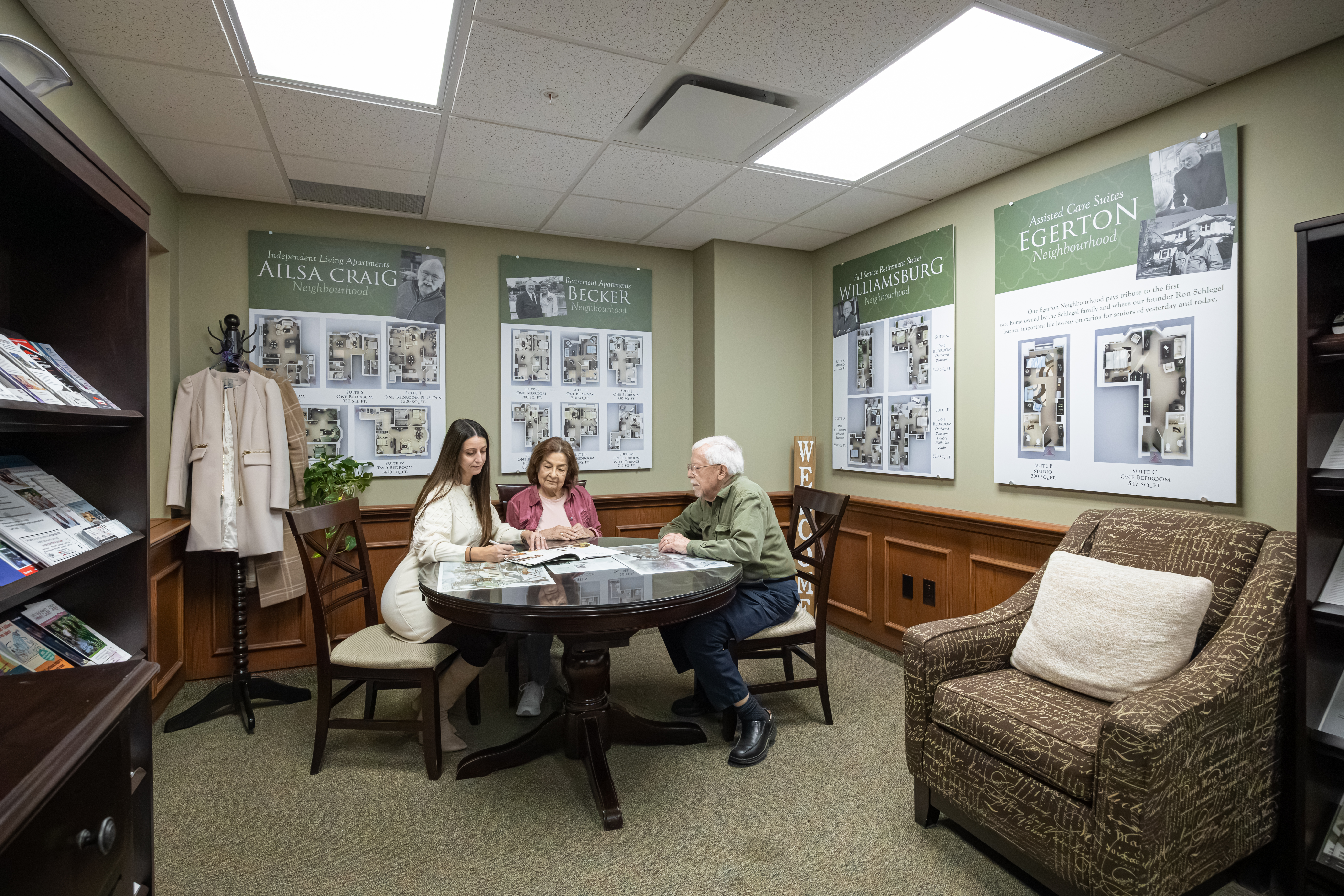 Seniors meeting with our Director of Lifestyle Options learning about the Village of Wentworth Heights