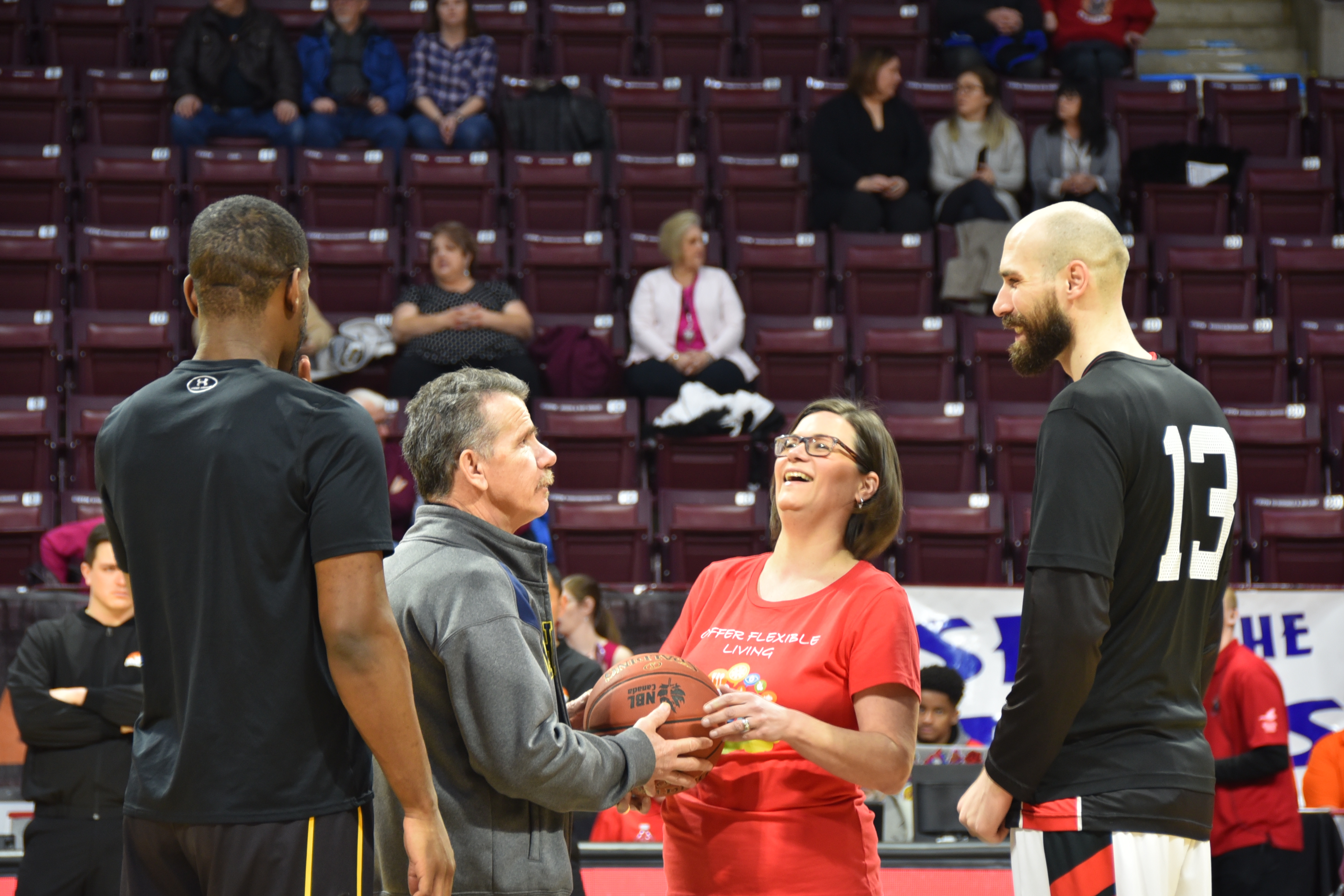 Marcel and Hannah are ready for the tip-off at the game.