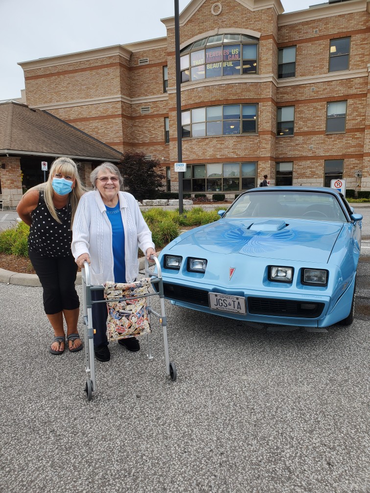 Enjoying the Classic Cars at the Village