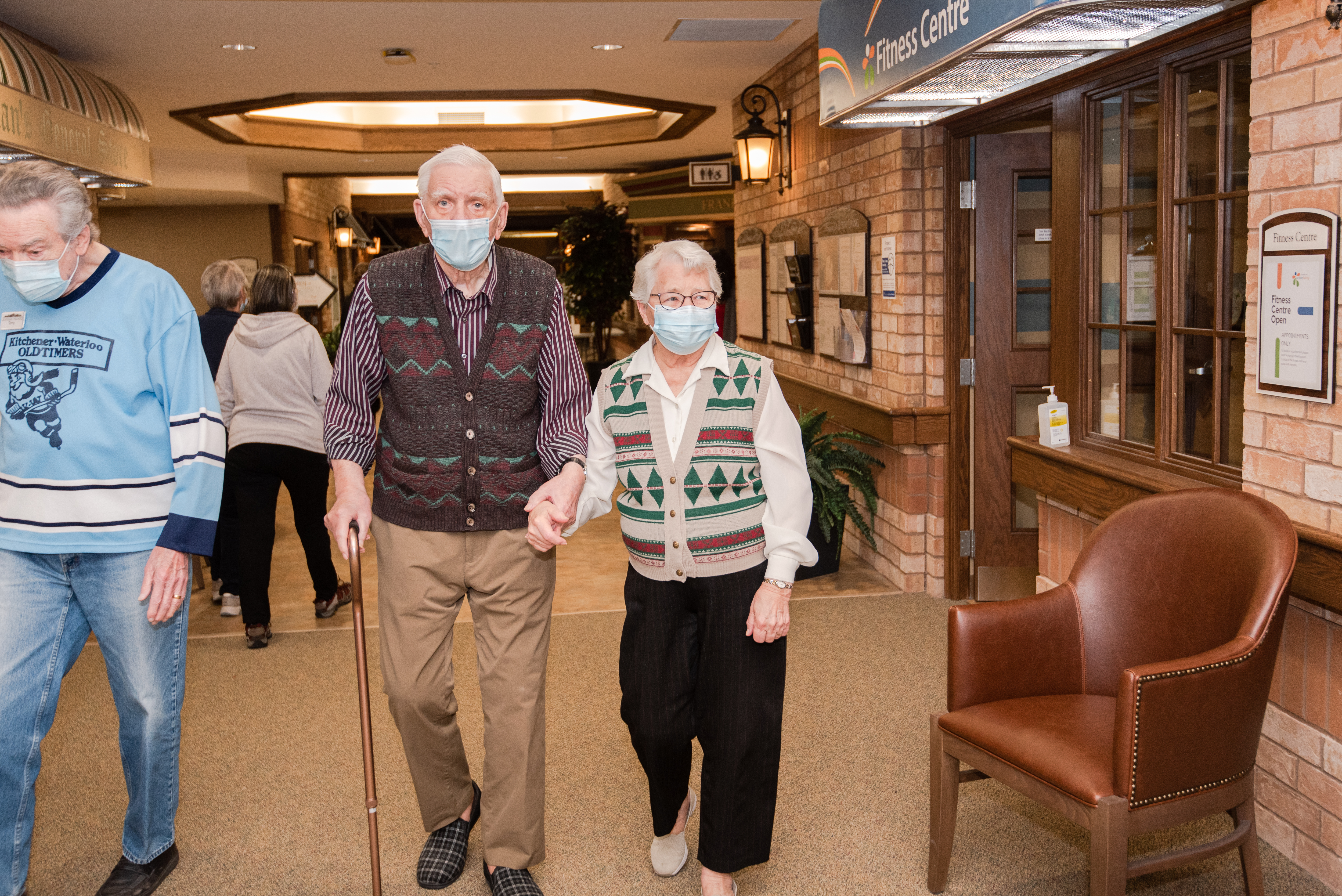 Resident couple walking down Main Street