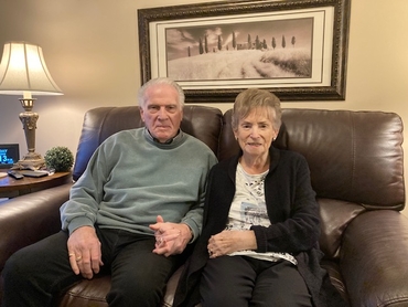 Bruce and Dorothy sitting on the couch