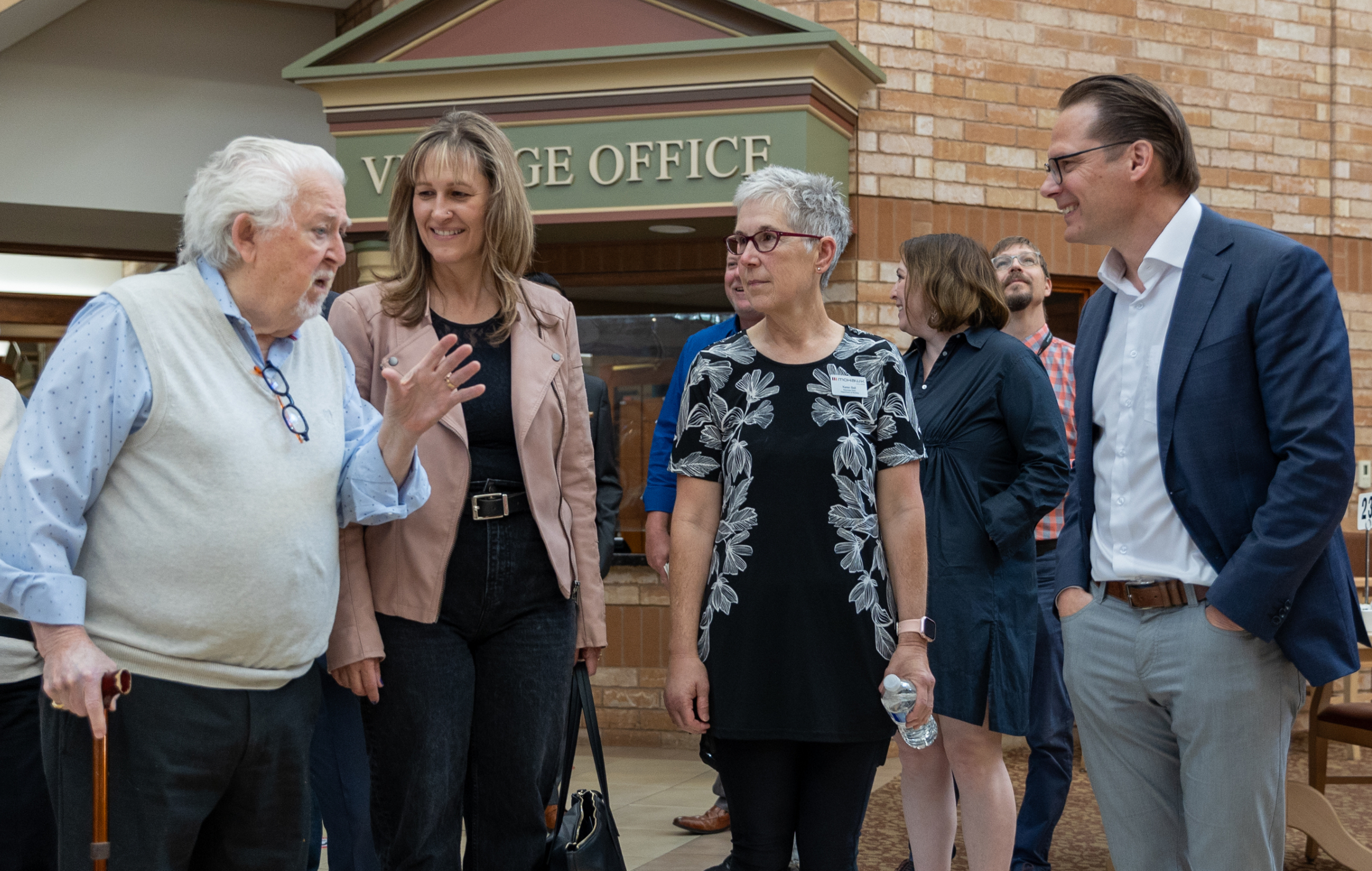 Tansley Woods resident's council president Doug Petitt speaks with Burlington Mayor Marianne Meed Ward, Mohawk College's Karen Ball and Schlegel Villages president and CEO Jamie Schlegel.