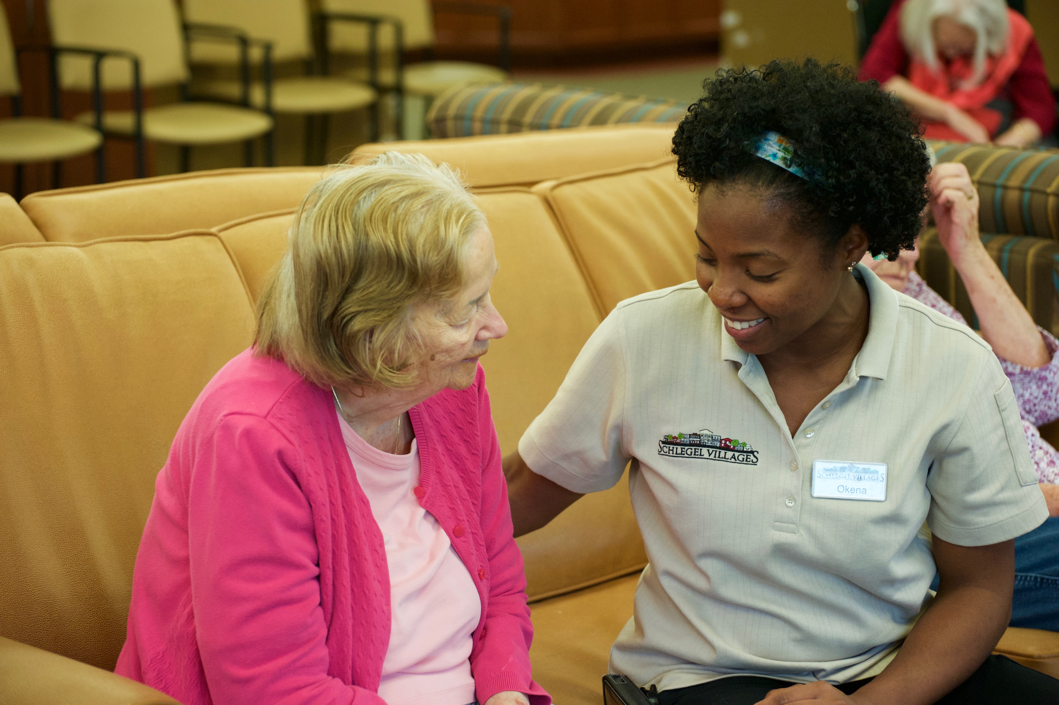 Team member talking with resident